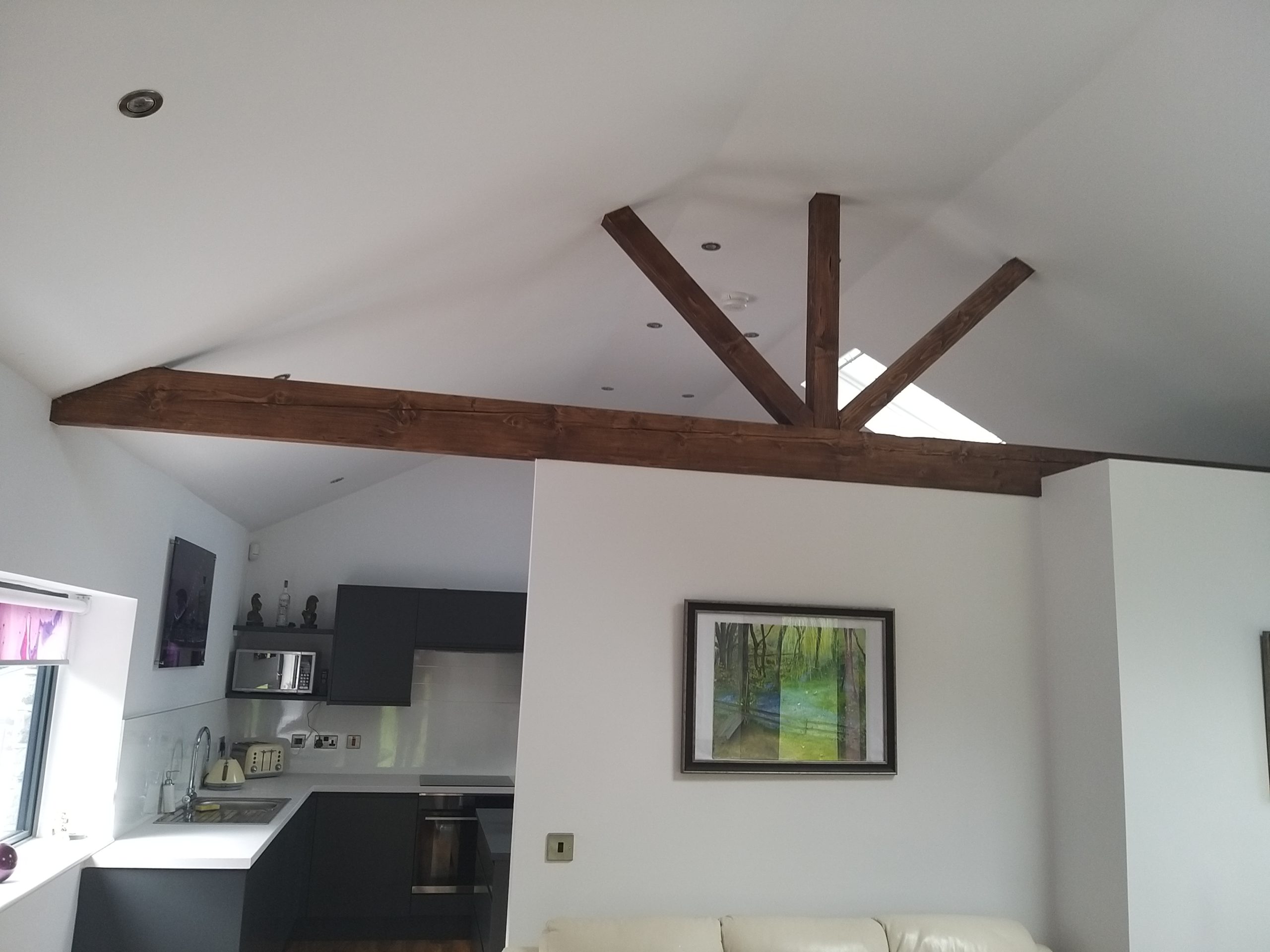 Wooden joist beams in a garage conversion