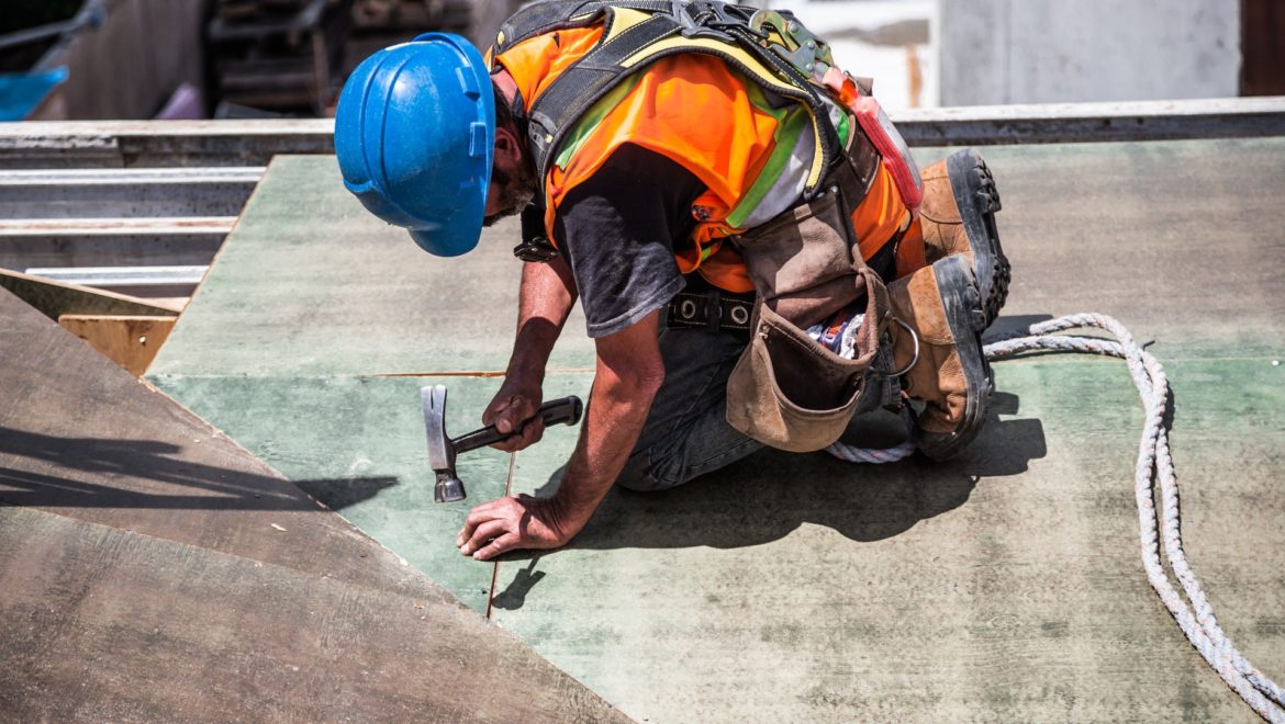 Builder working on a project following their rights and obligations